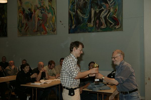 Sunday<br />John Rosenstock hands over an award to Peter Uhlmann